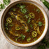 close up shot of bison bone broth in ceramic bowl